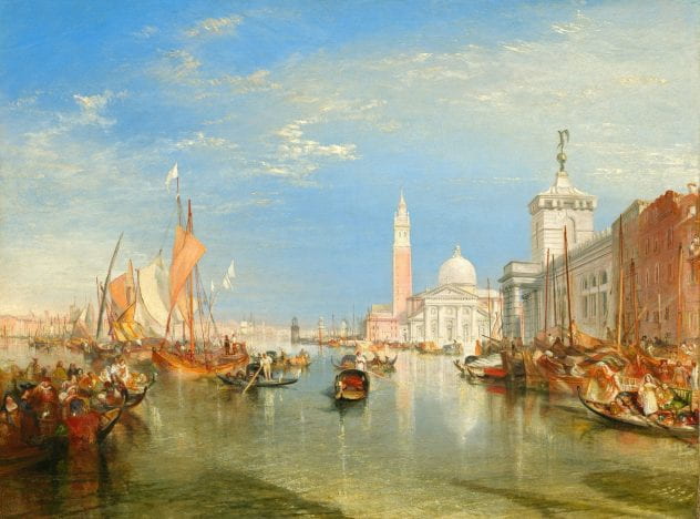 Painting of a canal in a Renaissance city (Venice) on a canal with many boats.